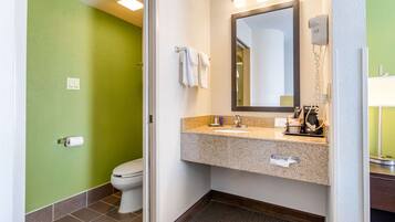 Shower, designer toiletries, hair dryer, towels