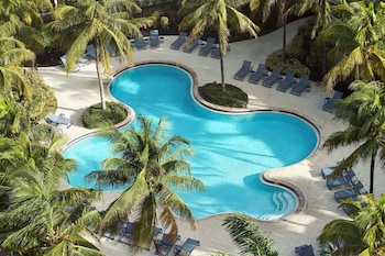 Outdoor pool, sun loungers at Hilton Fort Lauderdale Marina