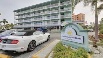 A multi-story hotel with a sign for Clearwater Beach Hotel.