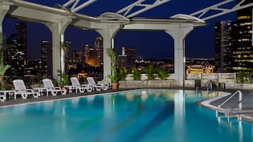 Outdoor pool, open 7:00 AM to 10:00 PM, pool umbrellas, sun loungers