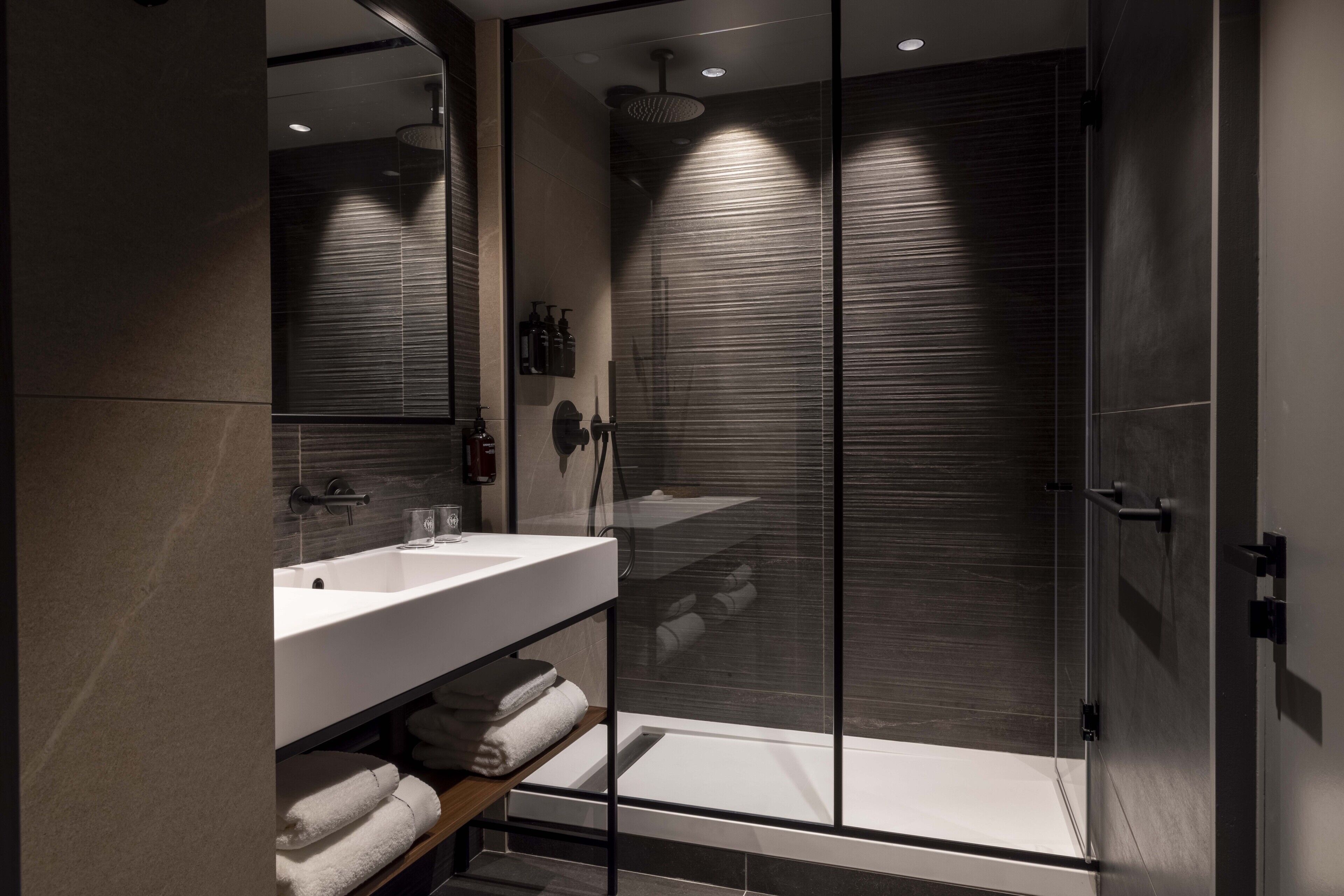 suite | bathroom | rainfall showerhead, free toiletries, hair dryer, bathrobes