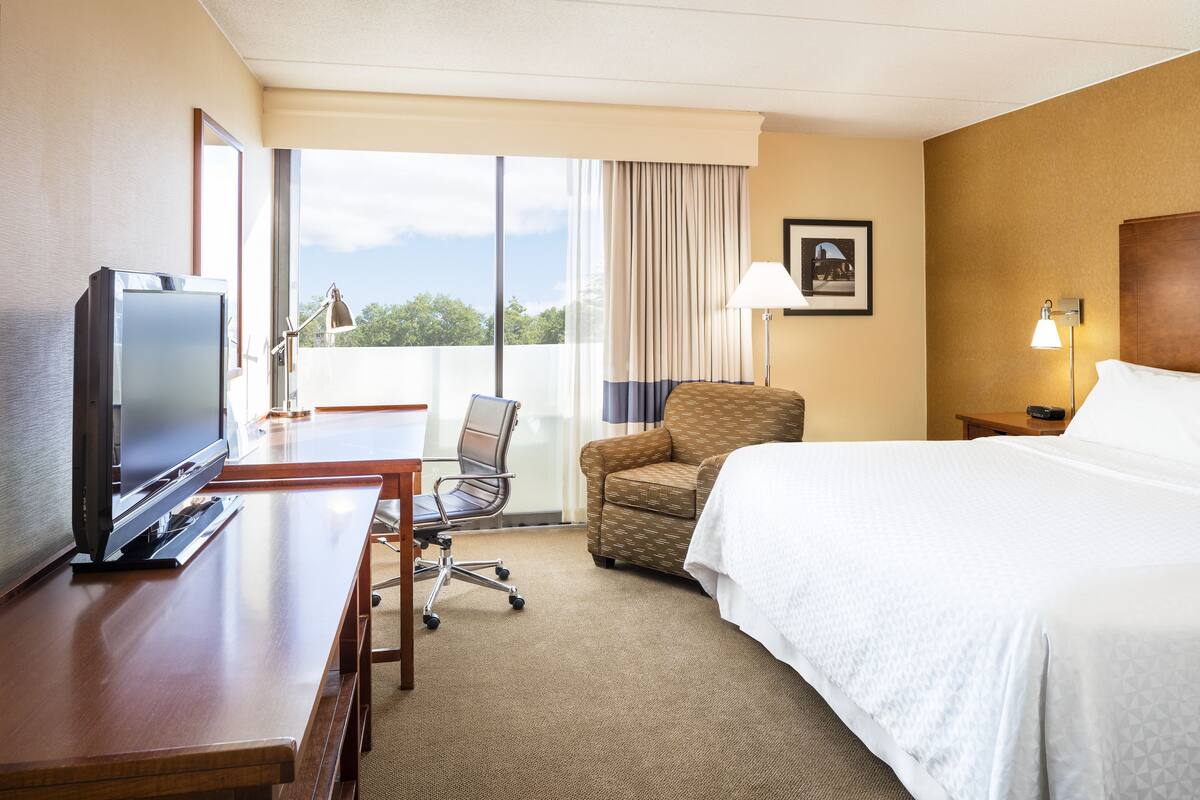 Premium bedding, pillow-top beds, desk, blackout curtains
