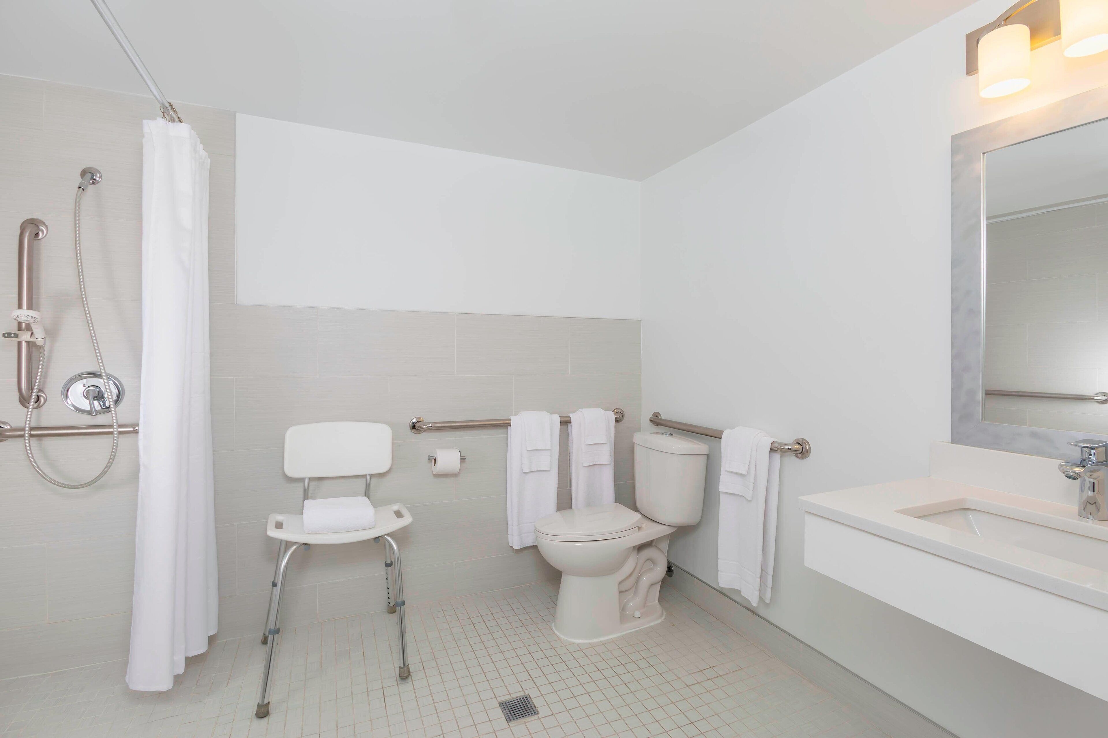 room, 2 queen beds | bathroom | combined shower/bathtub, free toiletries, hair dryer, towels