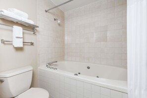 Combined shower/bathtub, hair dryer, towels