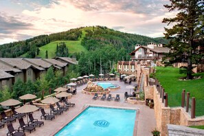 2 outdoor pools, open 7:00 AM to 9:00 PM, pool umbrellas, pool loungers