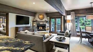 Luxury Suite, 2 Bedrooms (2 Kings) | Living area | Smart TV, video-game console, DVD player, iPod dock