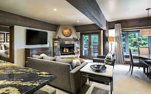 Luxury Suite, 2 Bedrooms (2 Kings) | Living area | Smart TV, video-game console, DVD player, iPod dock