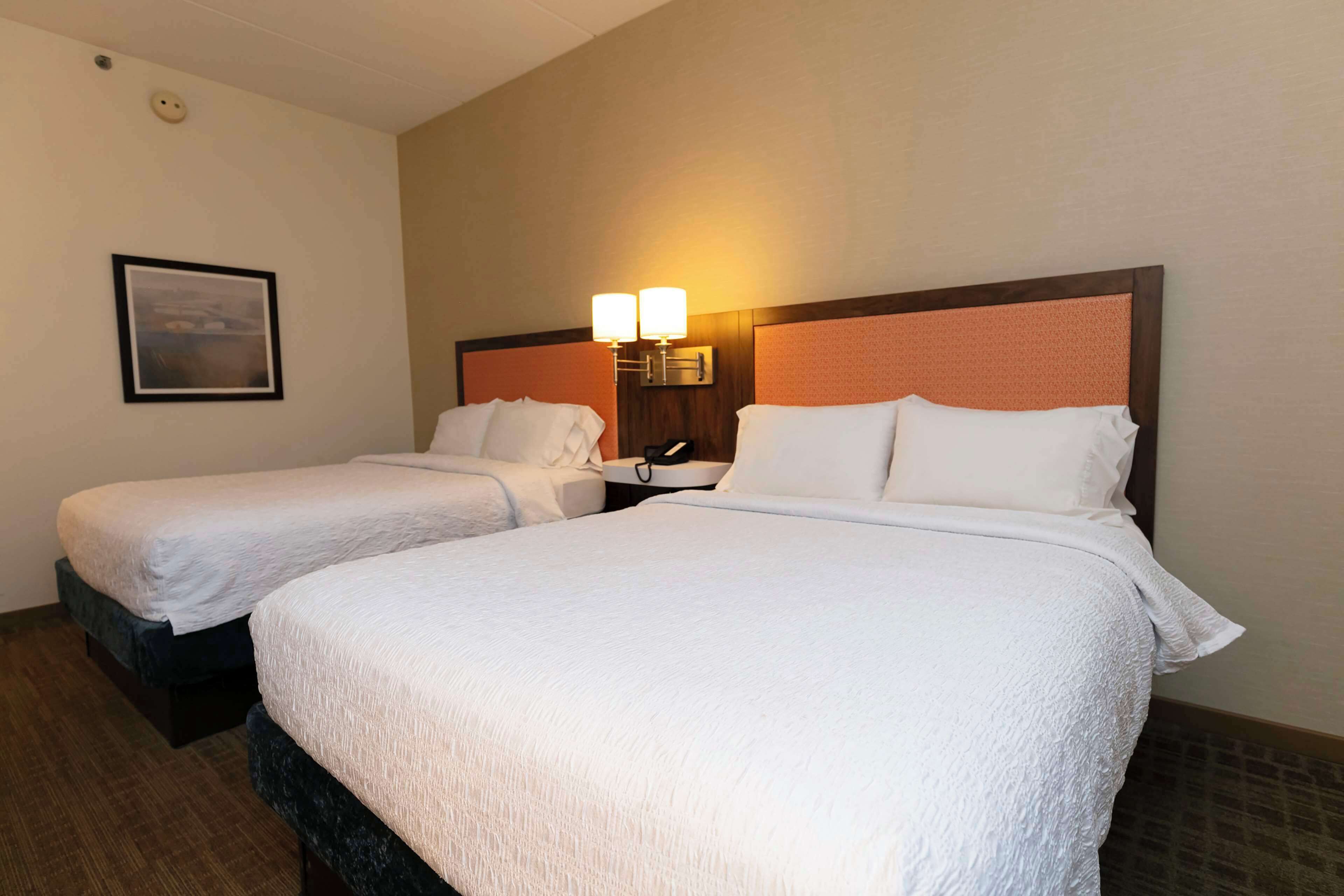 premium bedding, desk, blackout curtains, iron/ironing board