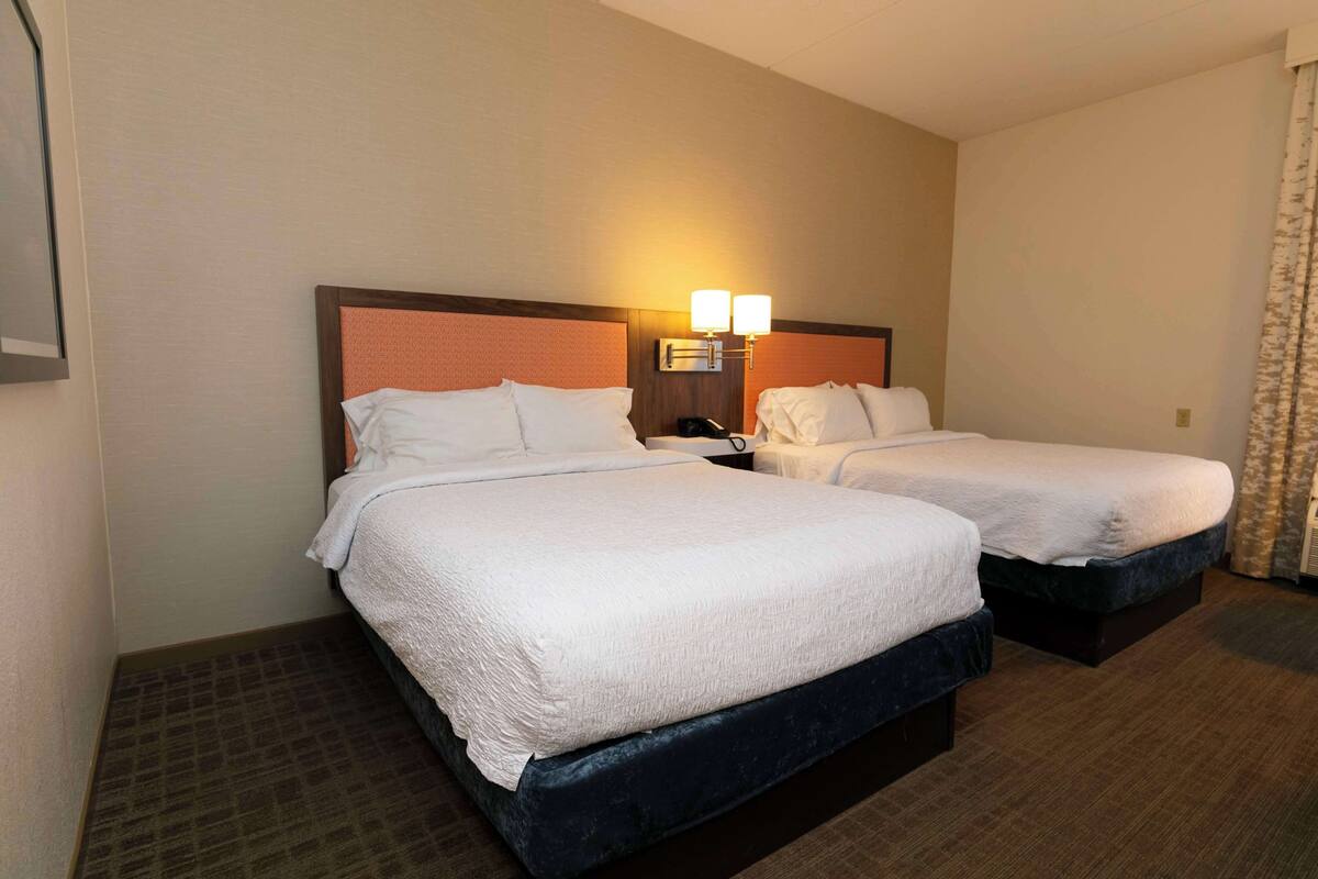 Premium bedding, desk, blackout drapes, iron/ironing board