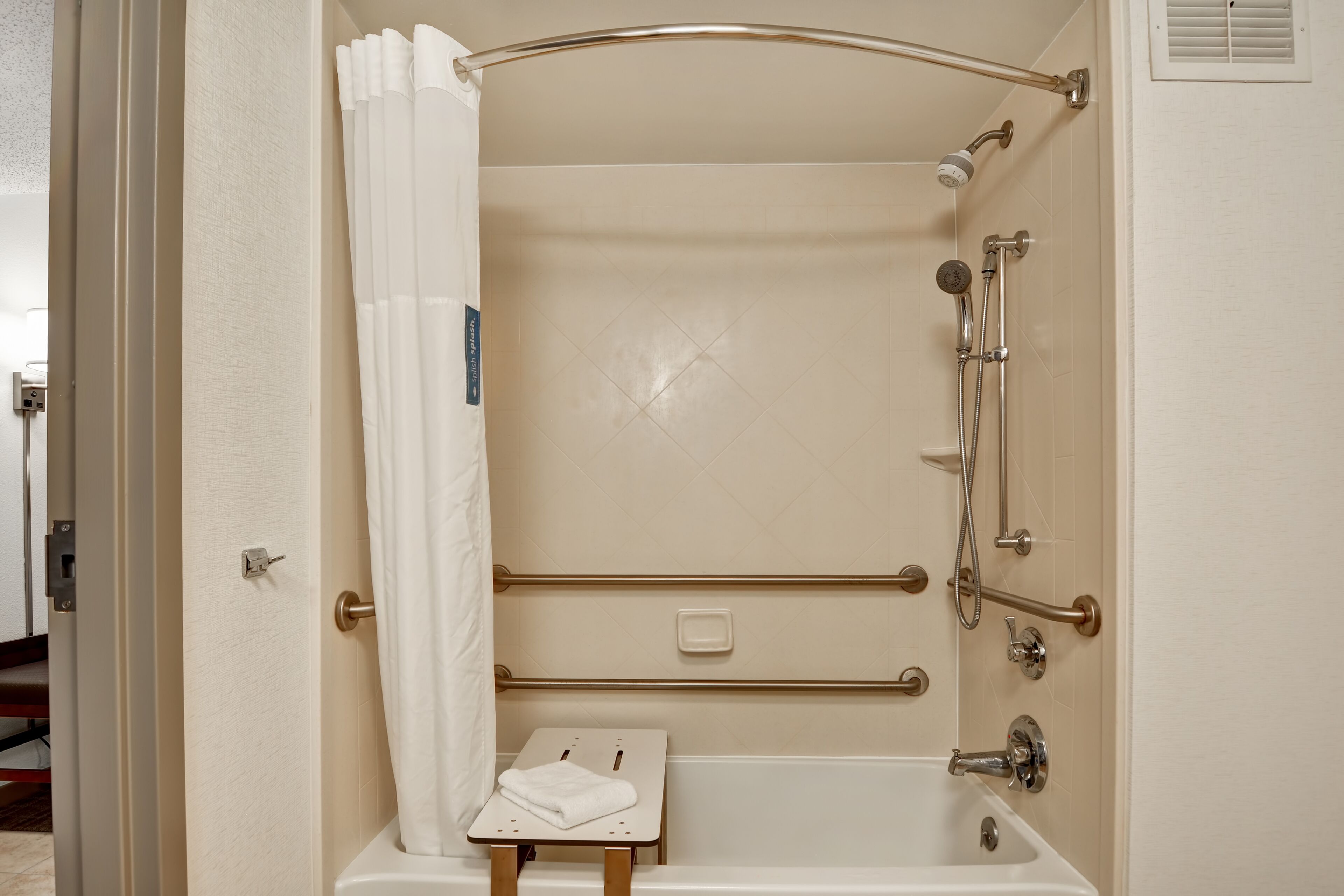 combined shower/bathtub, free toiletries, hair dryer, towels