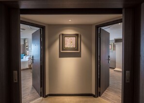 Family Room, 2 Bedrooms, Balcony | In-room safe, desk, laptop workspace, blackout drapes
