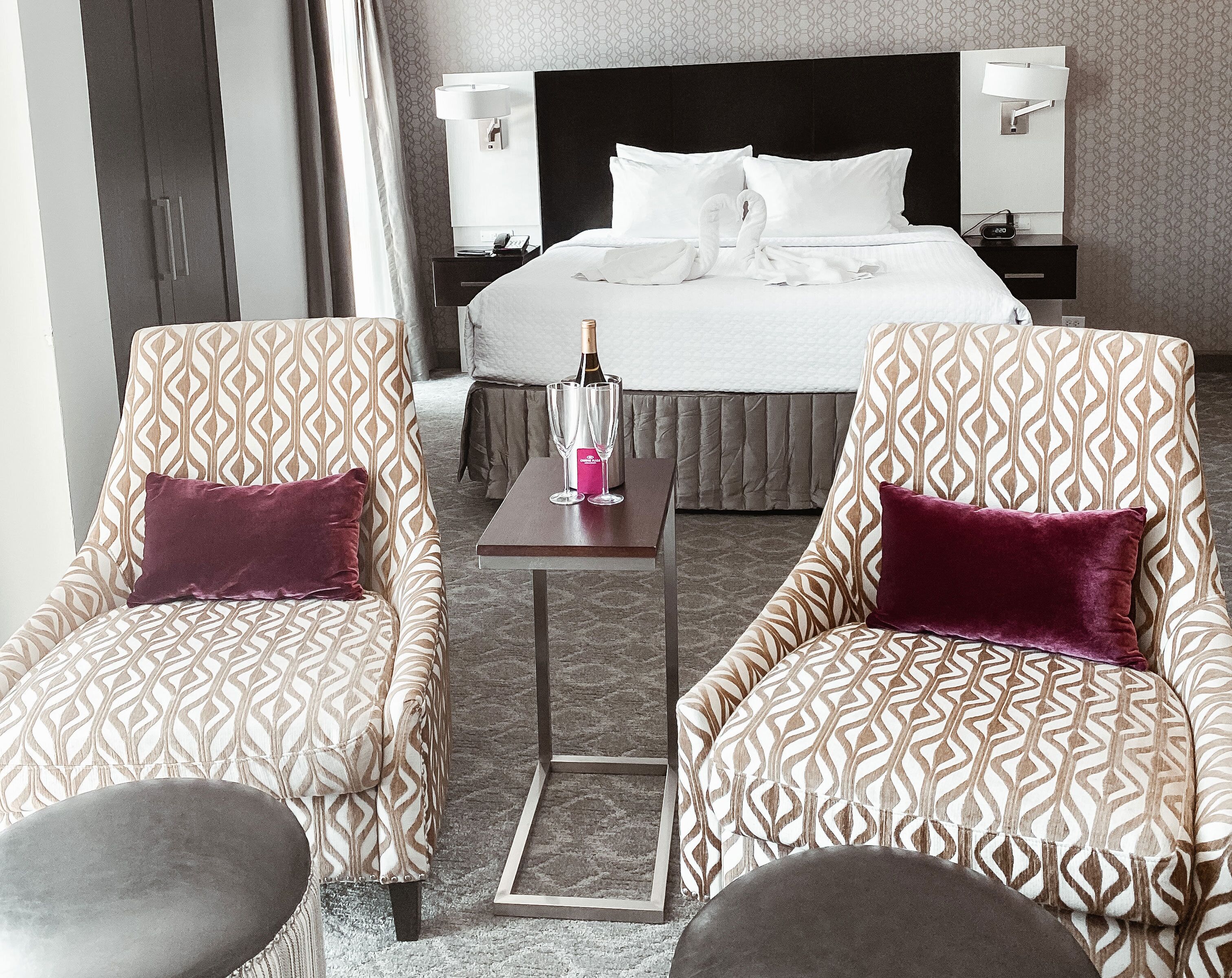 premium bedding, pillow-top beds, desk, blackout curtains