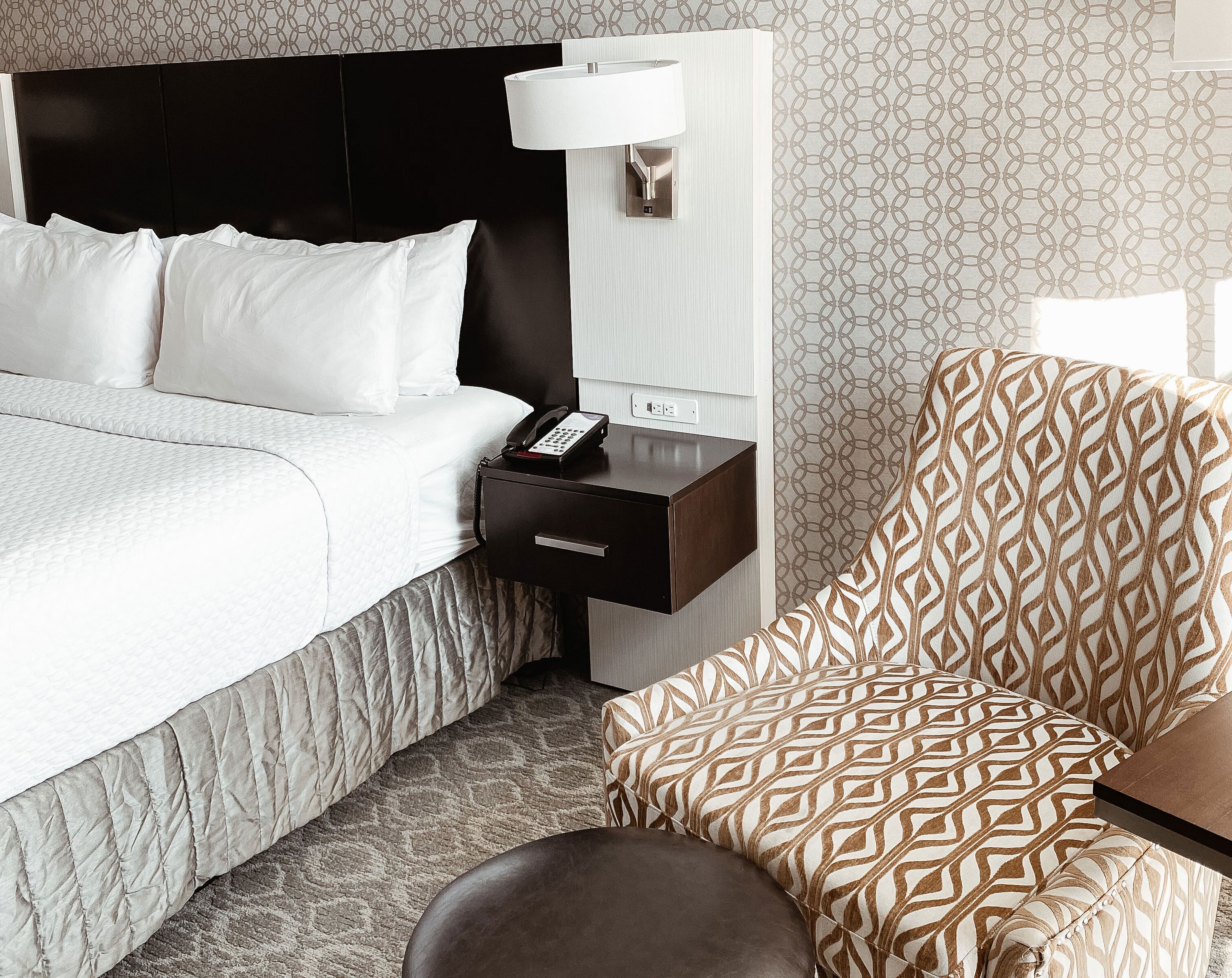 premium bedding, pillow-top beds, desk, blackout curtains