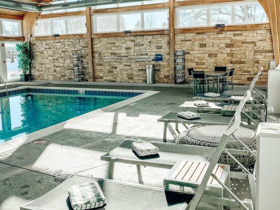 Indoor pool, open 7:00 AM to 10:00 PM, pool loungers
