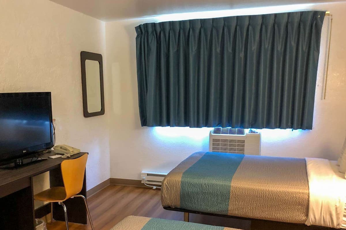 Desk, free WiFi, bed sheets