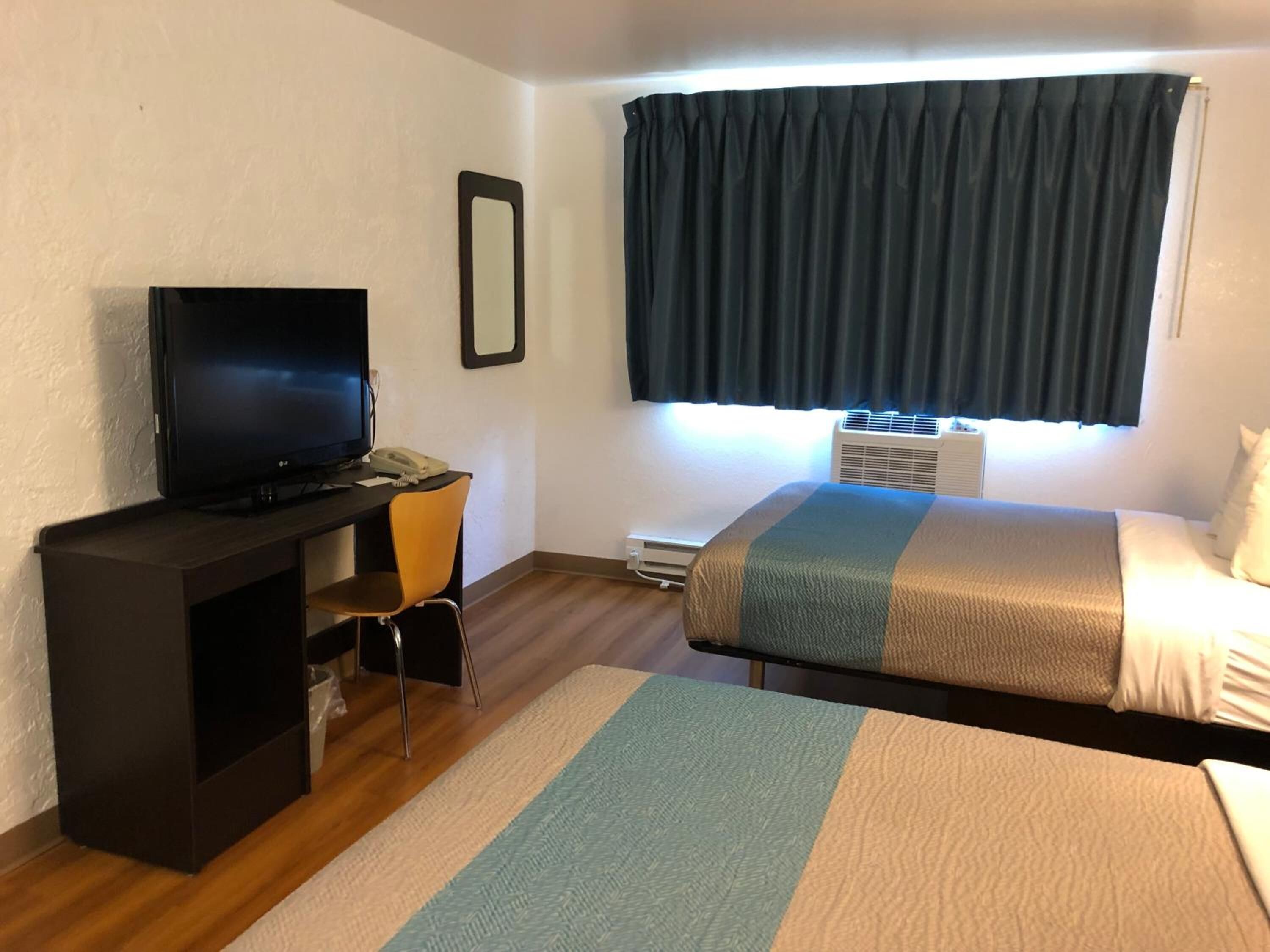 Desk, free WiFi, bed sheets