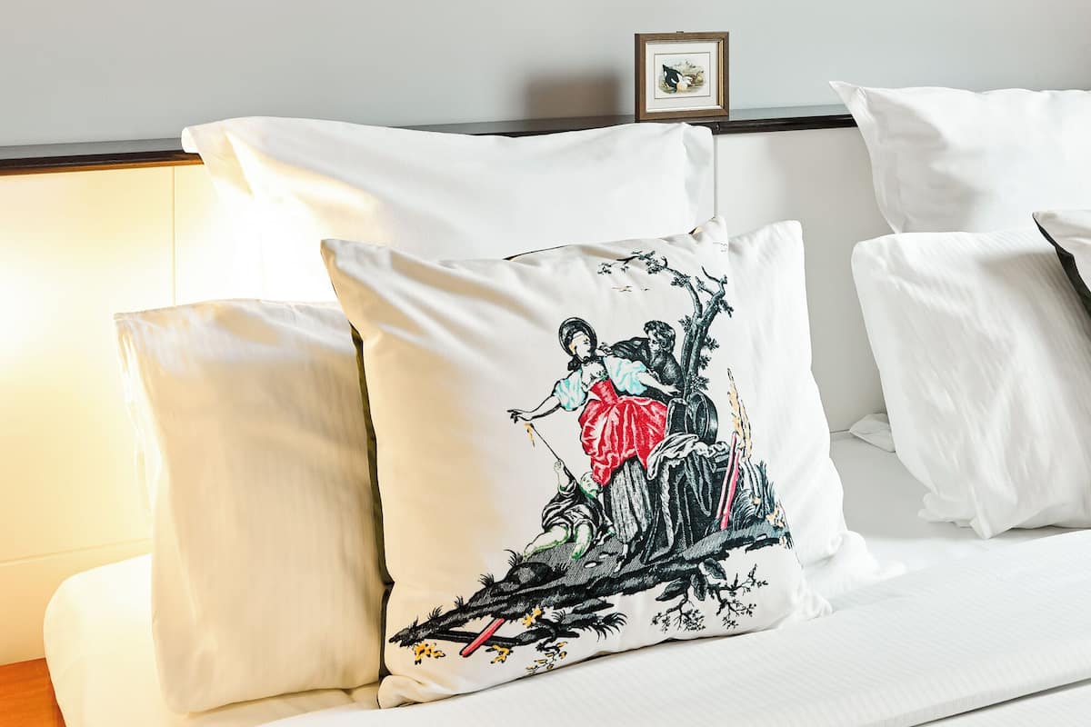 Executive Afterworks | Ropa de cama de alta calidad, camas con pillow-top y minibar