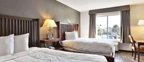Habitación Deluxe, 2 camas matrimoniales, para no fumadores | Sábanas italianas Frette, ropa de cama de alta calidad y edredón