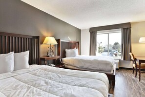 Deluxe-Zimmer, 2 Doppelbetten, Nichtraucher | Italienische Bettbezüge von Frette, hochwertige Bettwaren