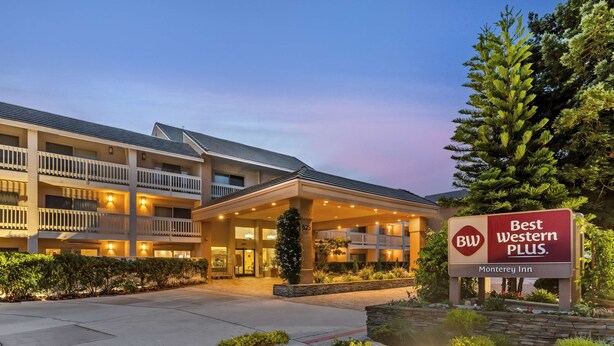 A hotel with a sign reading "Best Western Plus." It features a multi-story building with balconies and a landscaped entrance. - Best Western Plus Monterey Inn (Monterey)