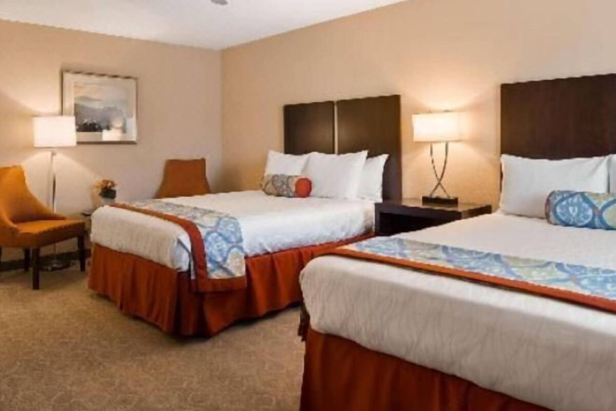 In-room safe, desk, iron/ironing board, cribs (free)