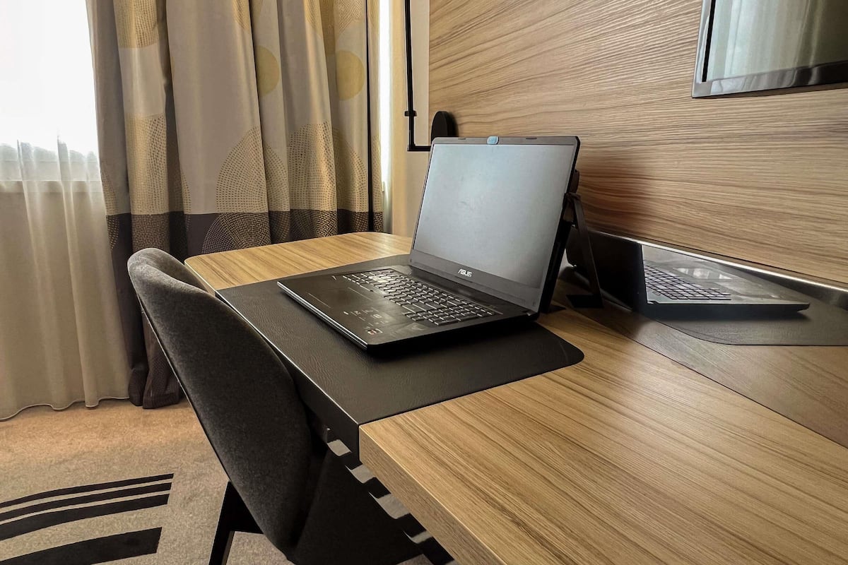 Premium bedding, memory-foam beds, free minibar, in-room safe