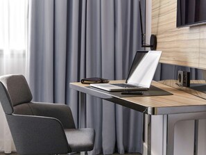 Premium bedding, memory-foam beds, free minibar, in-room safe