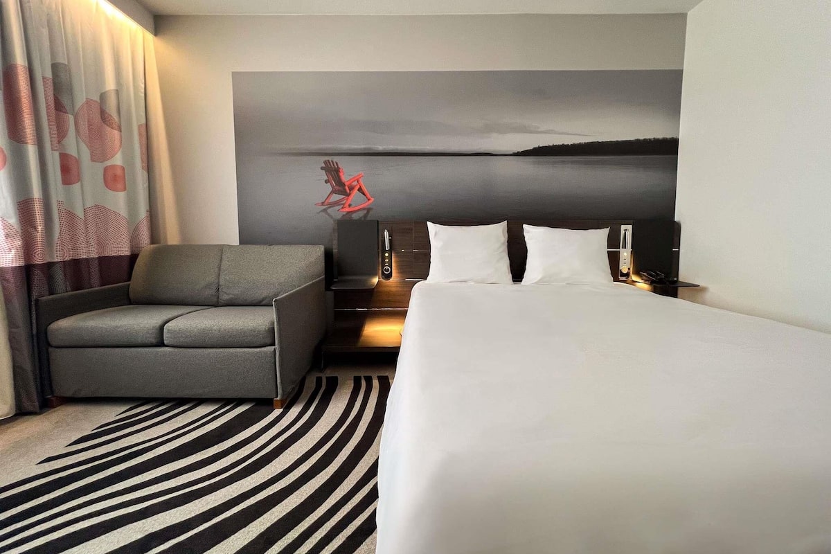 Premium bedding, memory-foam beds, free minibar, in-room safe
