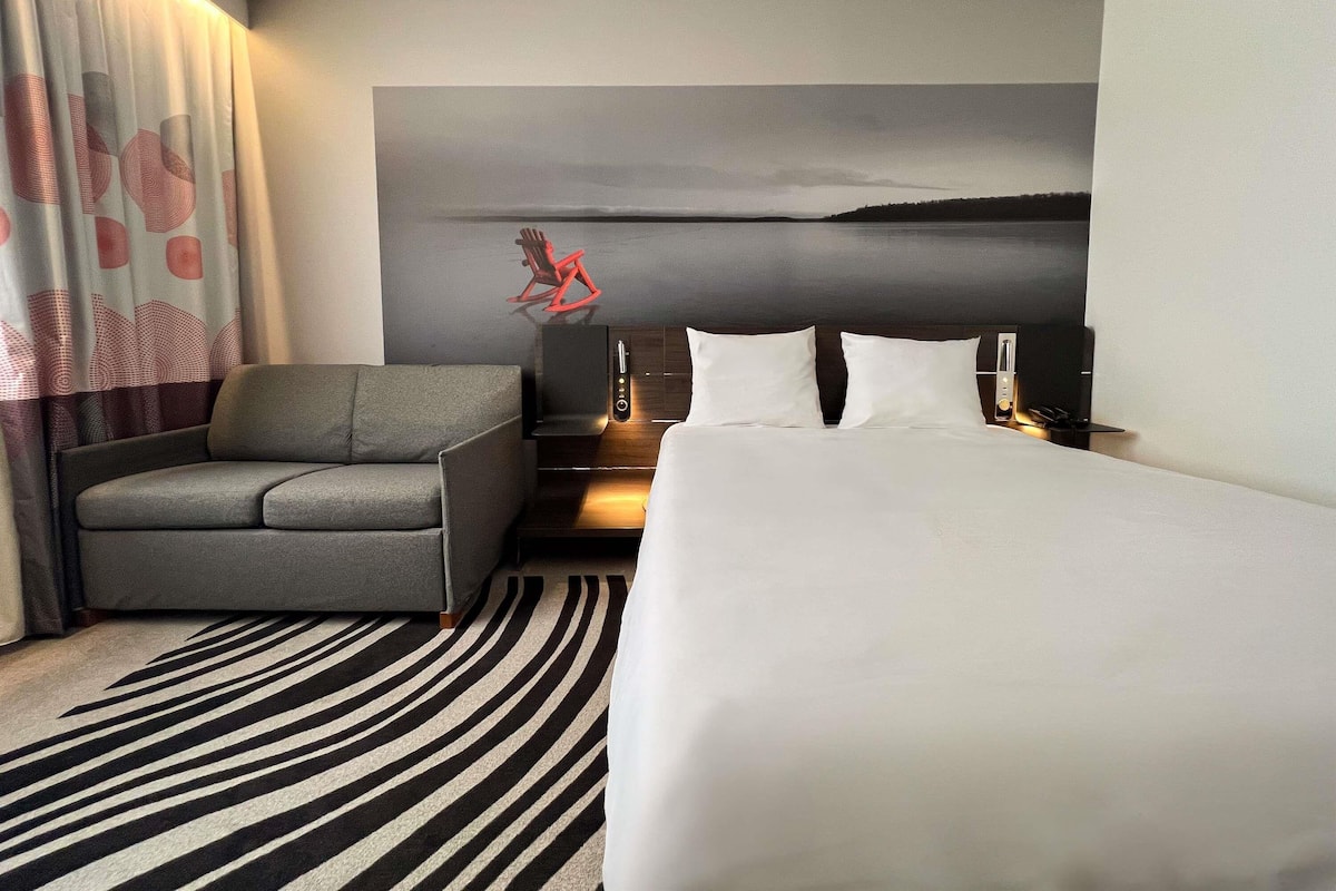 Premium bedding, memory-foam beds, free minibar, in-room safe