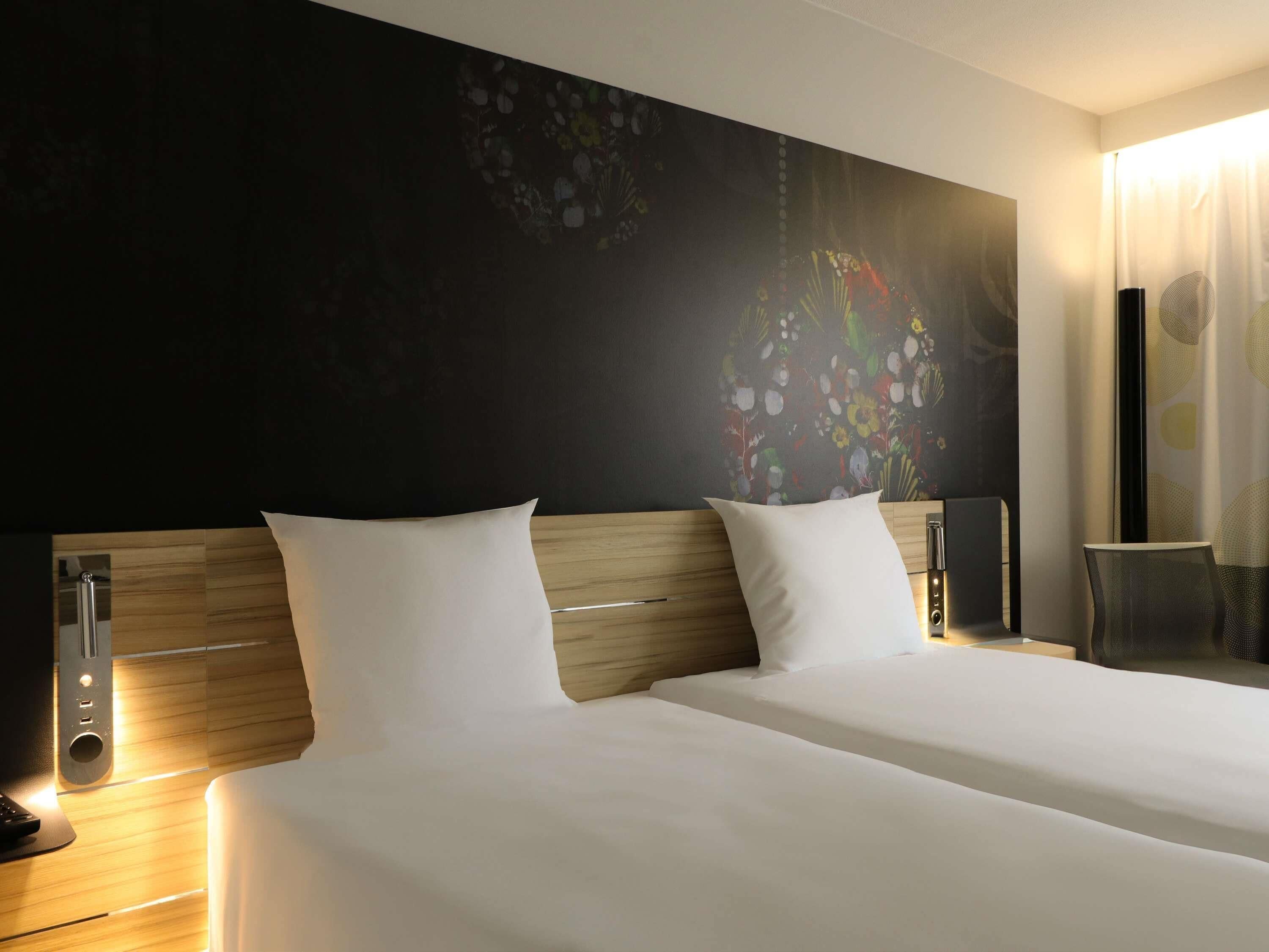 Premium bedding, memory-foam beds, free minibar, in-room safe