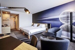Premium bedding, memory-foam beds, free minibar, in-room safe