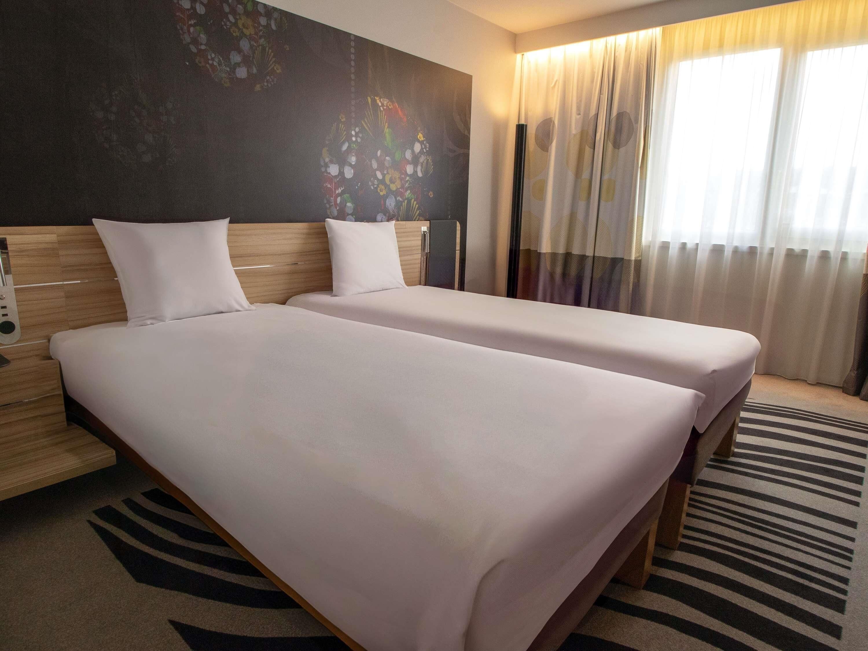 Premium bedding, memory-foam beds, free minibar, in-room safe