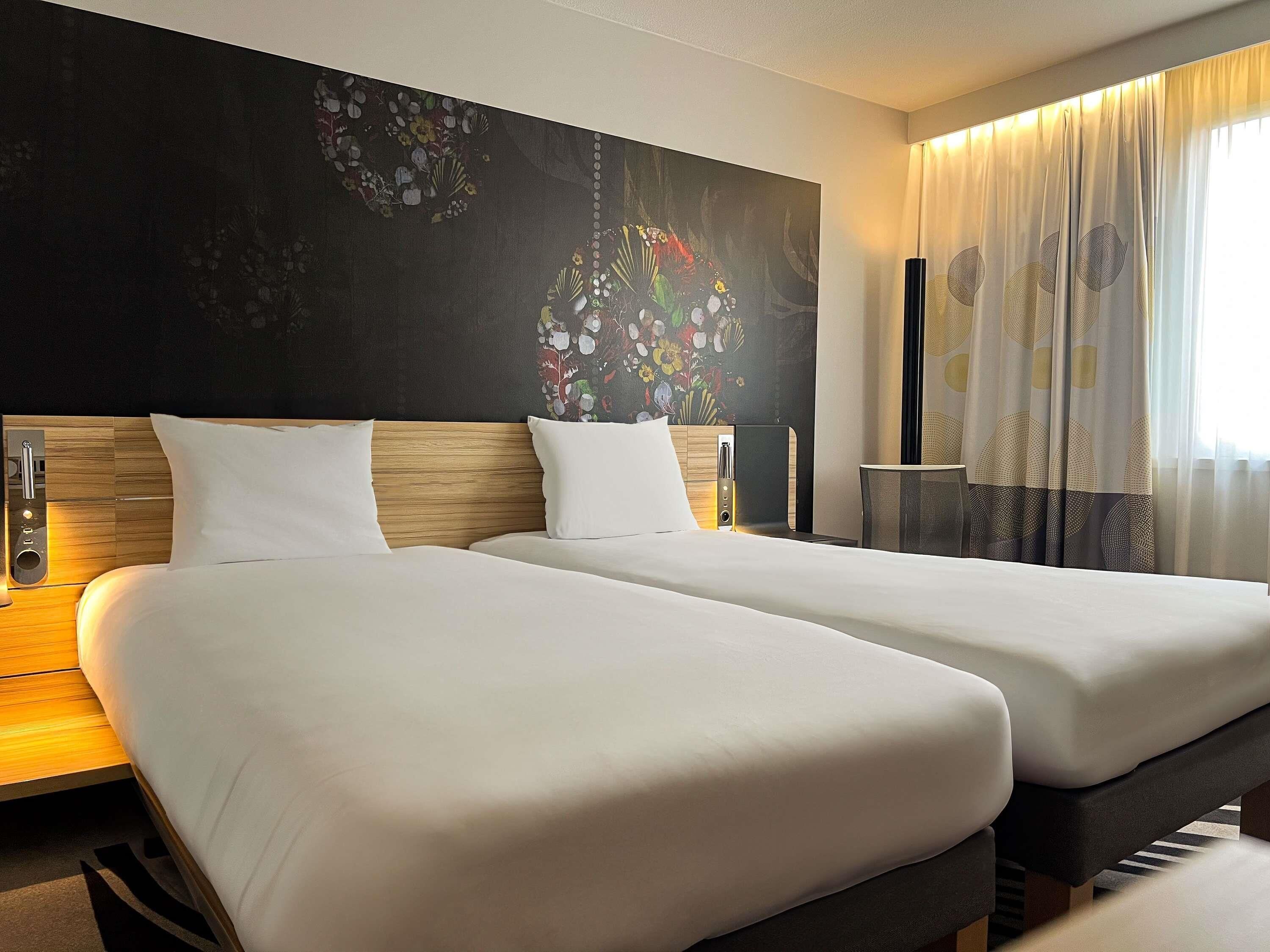 Premium bedding, memory-foam beds, free minibar, in-room safe