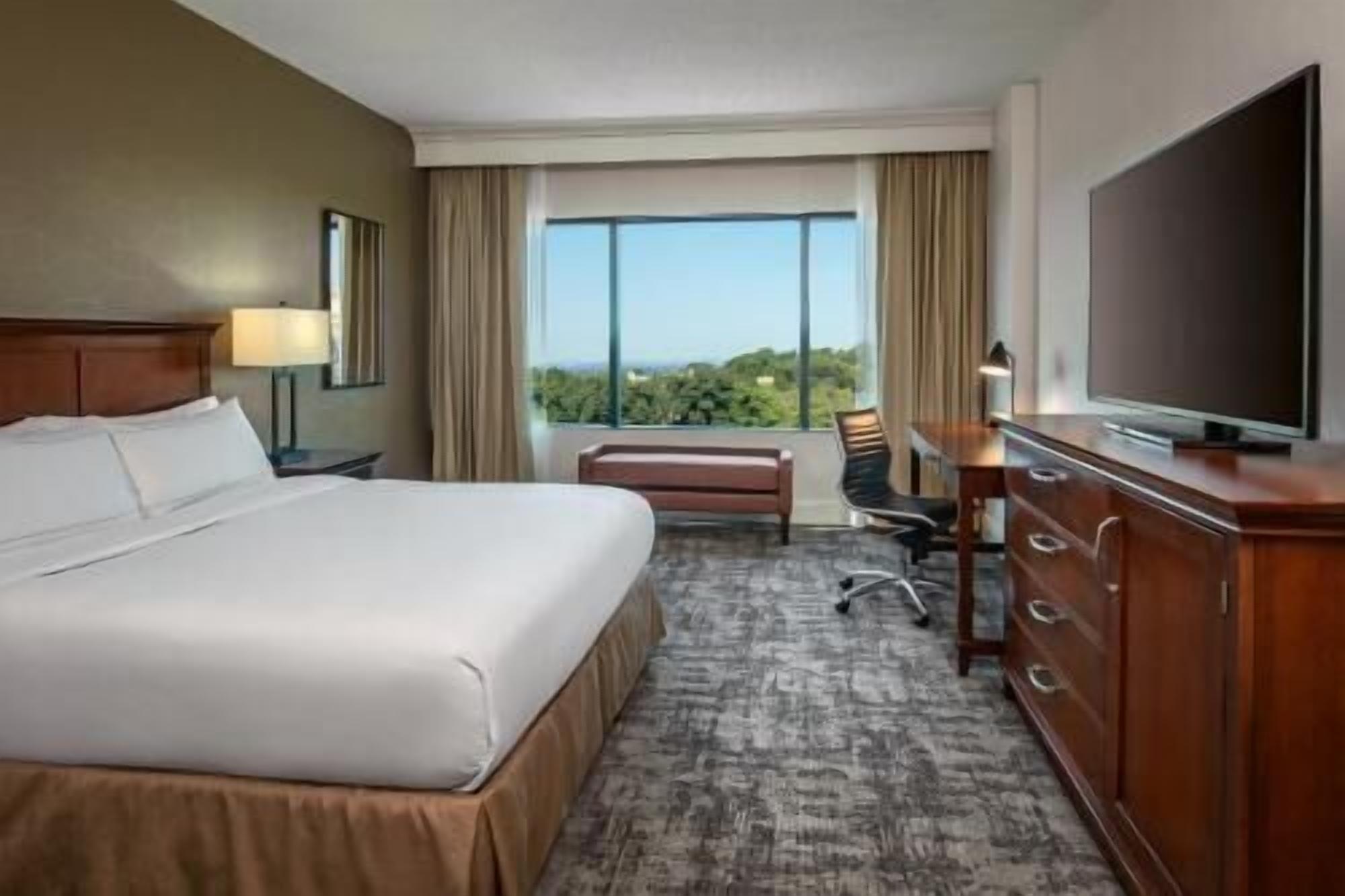 Premium bedding, down comforters, in-room safe, desk