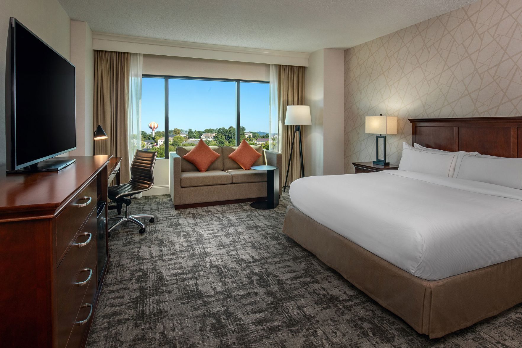 Premium bedding, down comforters, in-room safe, desk