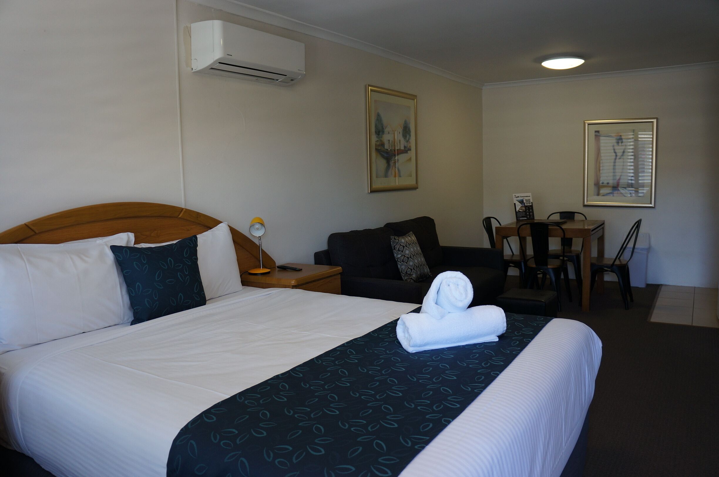 queen twin suite | desk, laptop workspace, blackout curtains, iron/ironing board