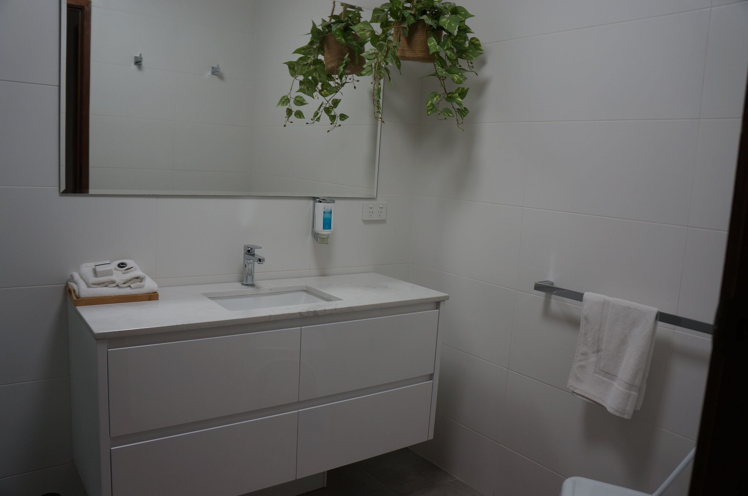 queen twin suite | desk, laptop workspace, blackout curtains, iron/ironing board