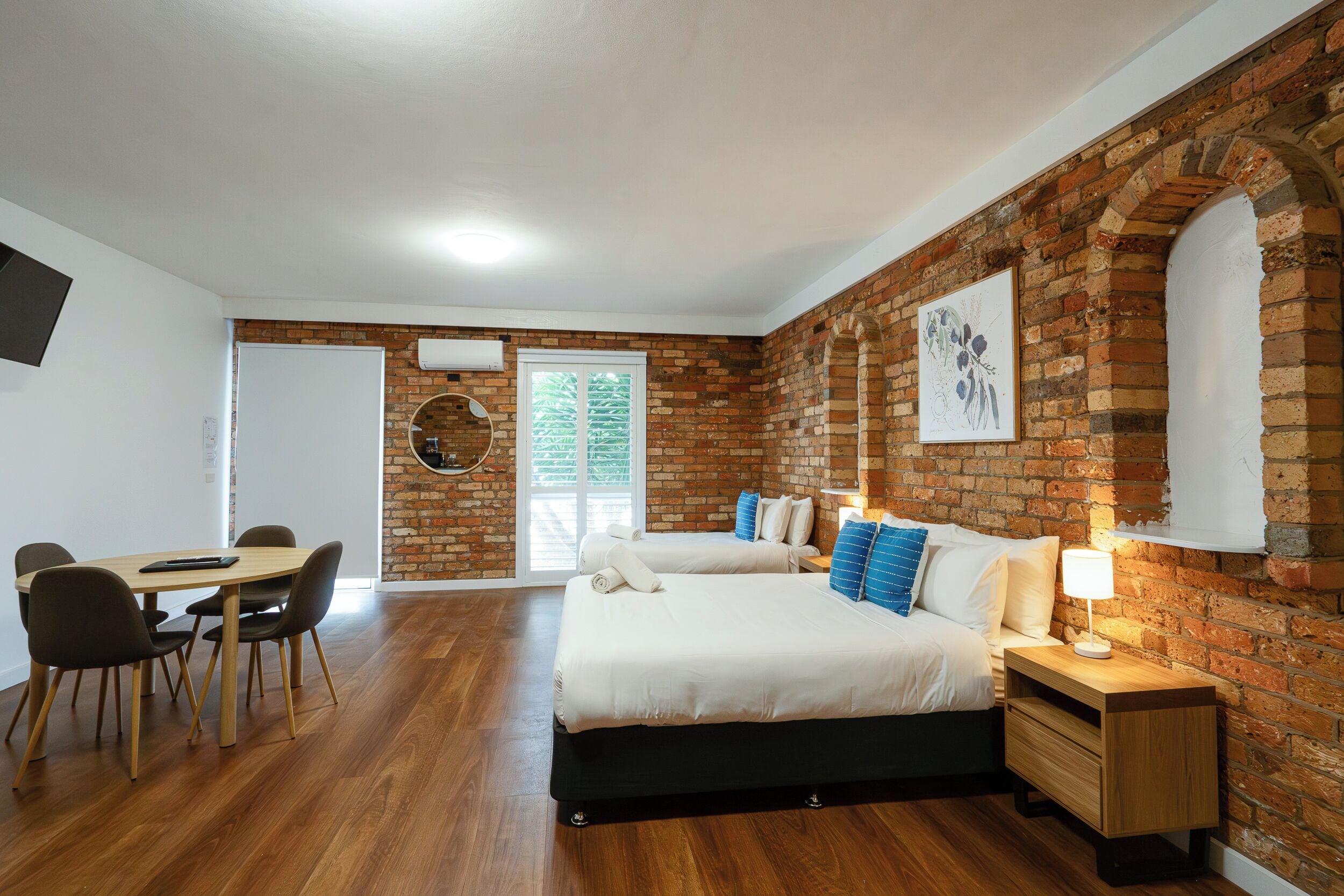 Standard Apartment | Desk, laptop workspace, blackout curtains, iron/ironing board