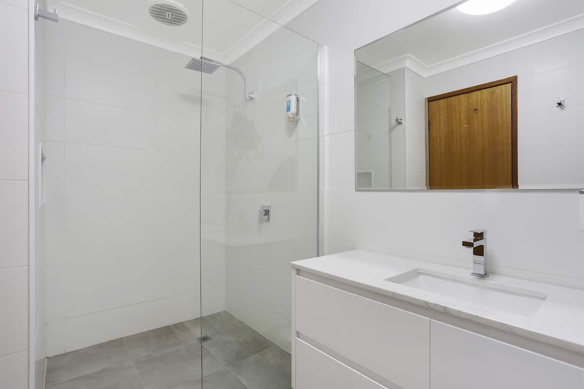 queen twin suite | bathroom | shower, rainfall showerhead, free toiletries, hair dryer