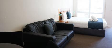 Family Suite | Desk, laptop workspace, blackout drapes, iron/ironing board