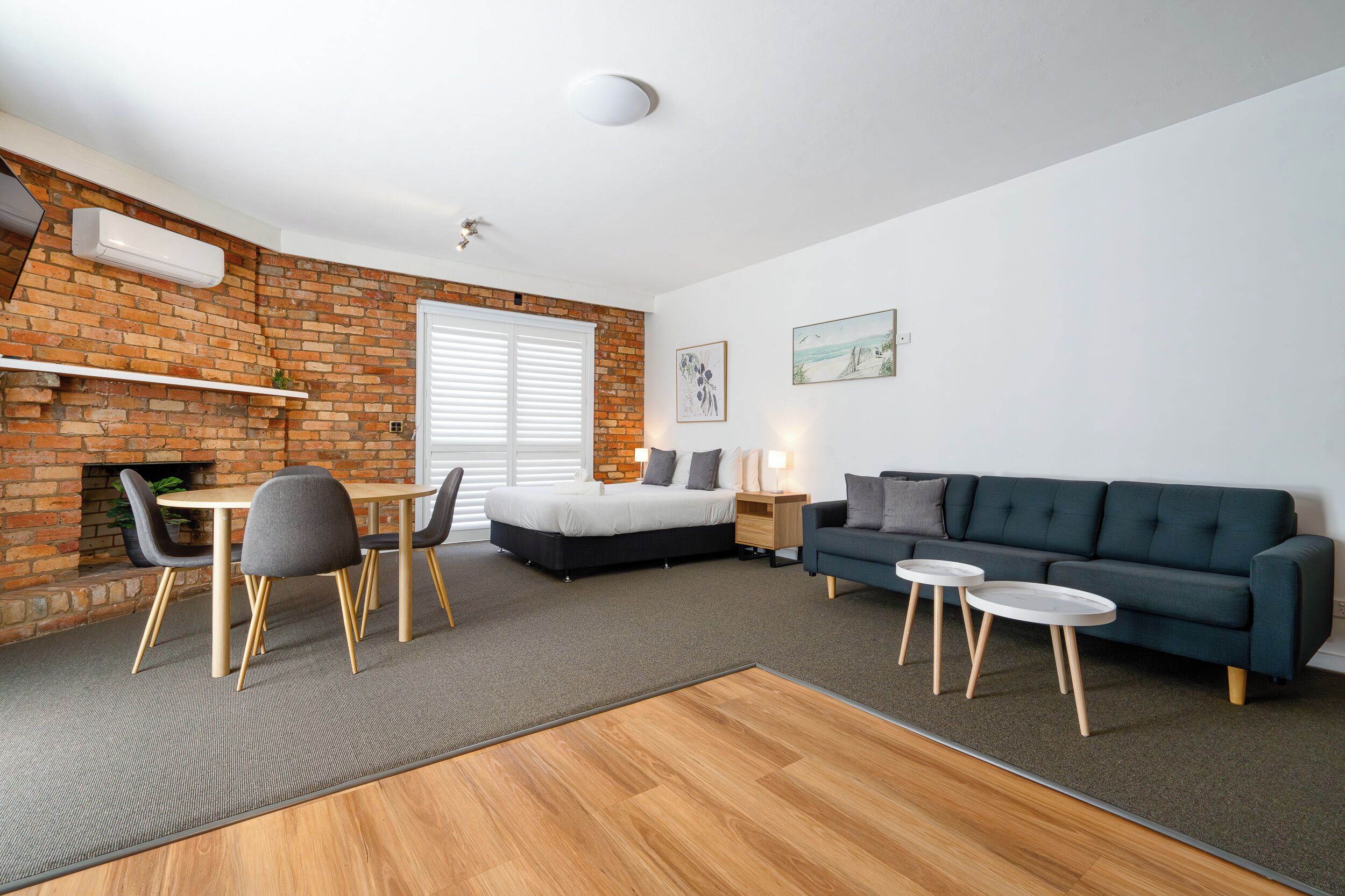 Desk, laptop workspace, blackout curtains, iron/ironing board