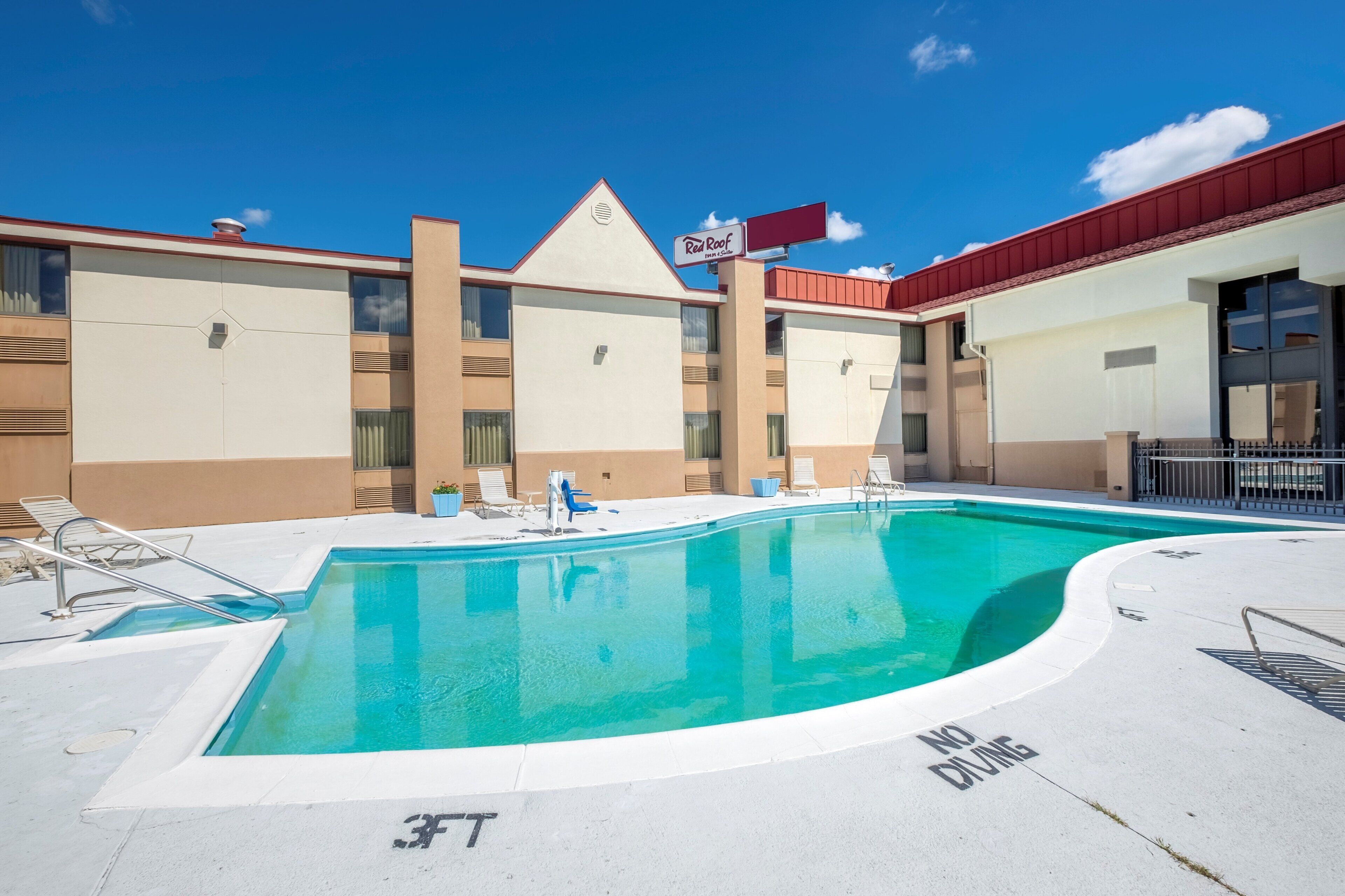 Seasonal outdoor pool, pool umbrellas, pool loungers