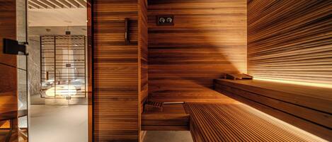 A modern sauna with wooden slats, a bench, and a small plaque on the wall.