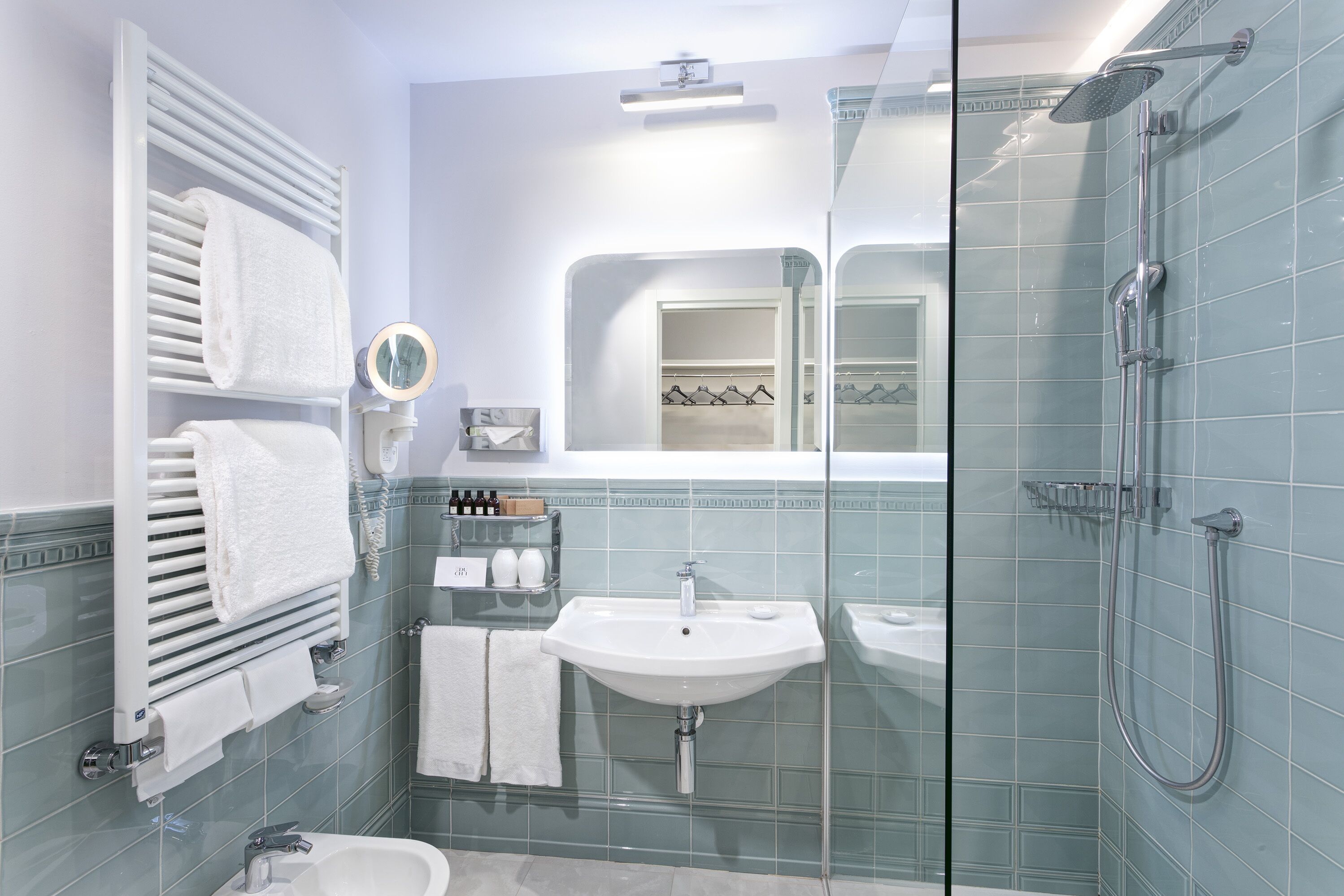 deluxe room | bathroom | shower, free toiletries, hair dryer, bathrobes