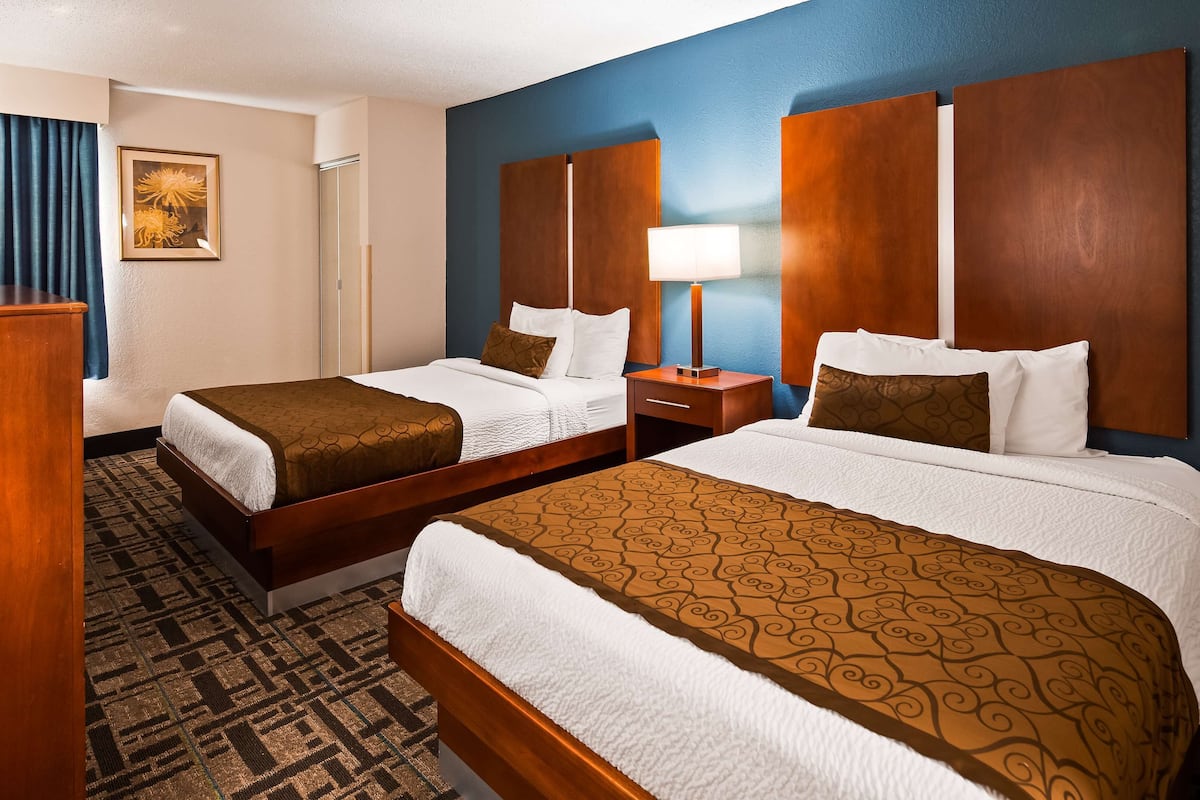 standard room, 2 double beds, non smoking, refrigerator & microwave | desk, laptop workspace, blackout curtains, iron/ironing board