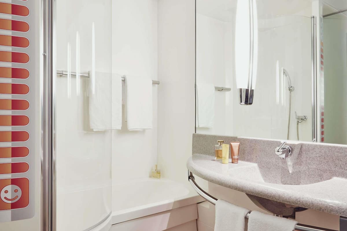 Premium bedding, pillow-top beds, desk, laptop workspace