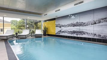 Indoor pool, open 6:00 AM to 10:00 PM, pool loungers