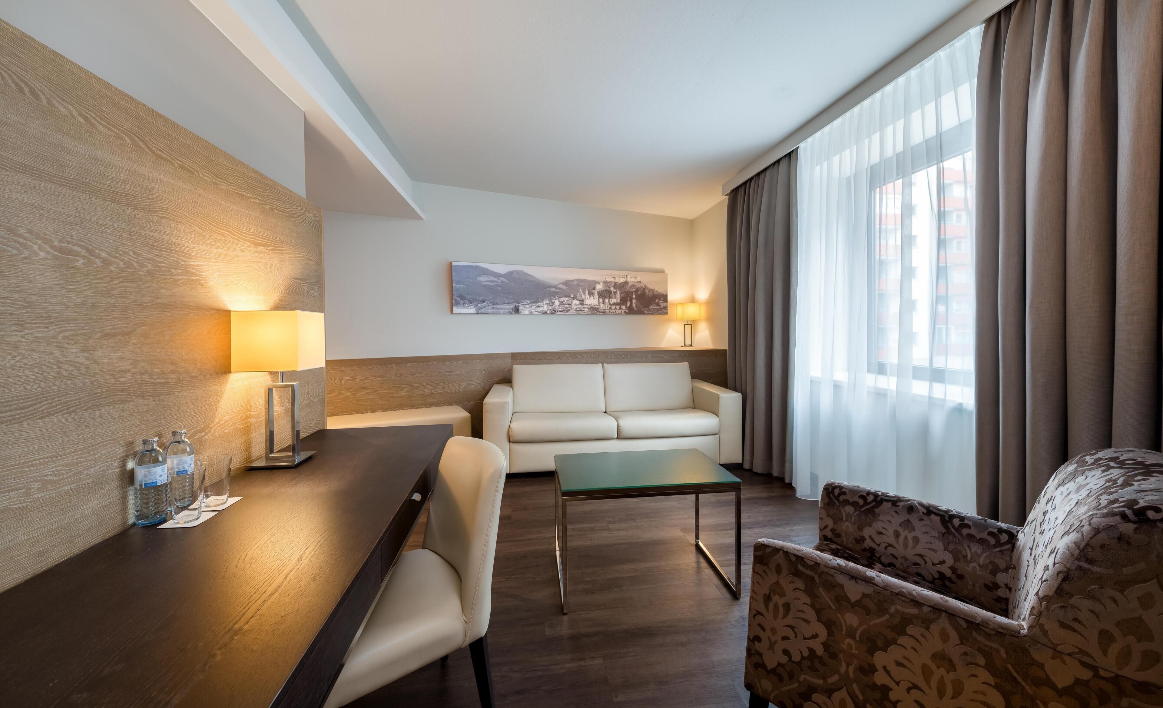 Junior Suite, City View | Hypo-allergenic bedding available, in-room safe, desk, laptop workspace