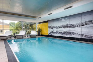 Indoor pool, open 6:00 AM to 10:00 PM, sun loungers