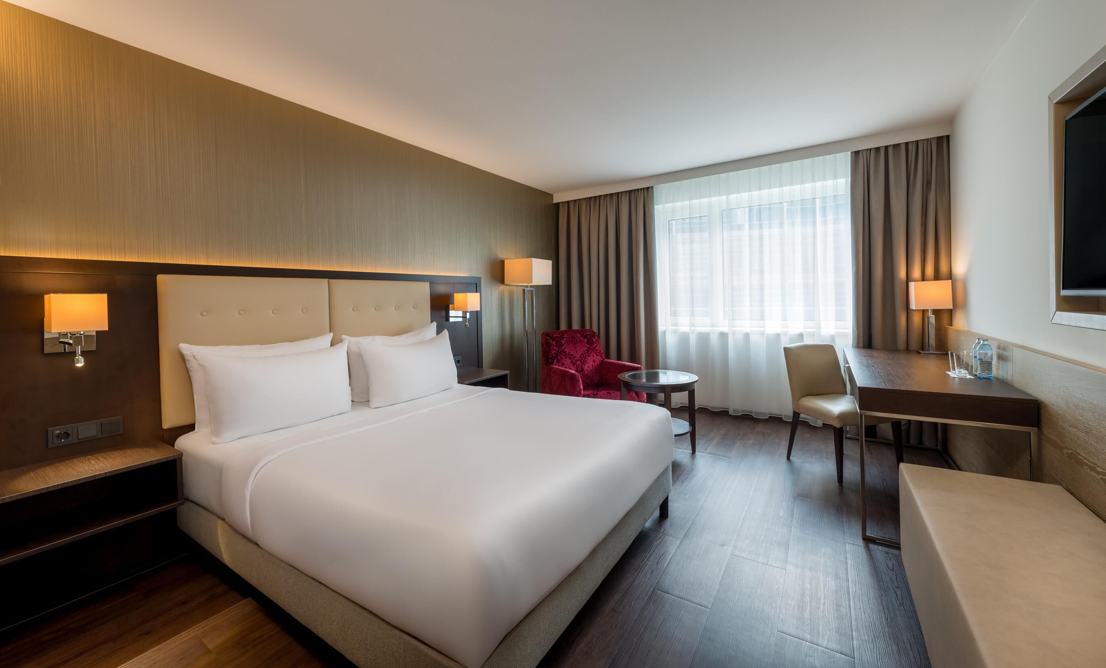 Hypo-allergenic bedding available, in-room safe, desk, laptop workspace